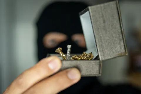 a hand holding a key