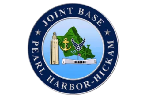 Seal of Joint Base Pearl Harbor-Hickam with military symbols and island map on blue background