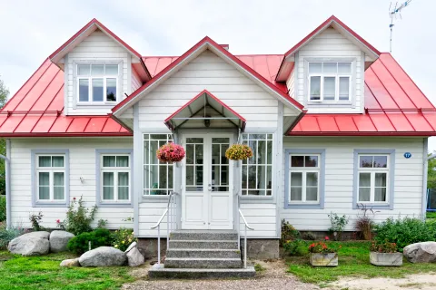 a house with trees in the background