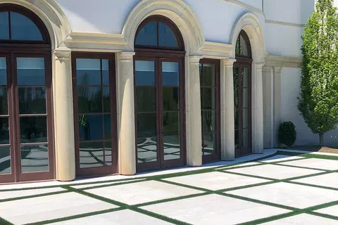 Create A Beautiful Landscape With Artificial Grass And Stepping Stones