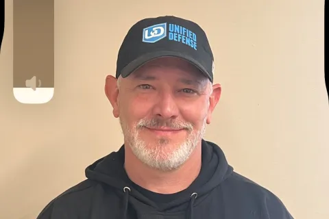 a man wearing a hat