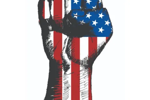 Raised fist painted with American flag stars and stripes symbolizing patriotism and unity.