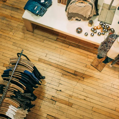 a purse and a purse on a wooden floor