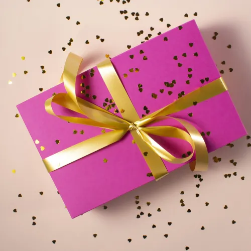 a pink and yellow gift box