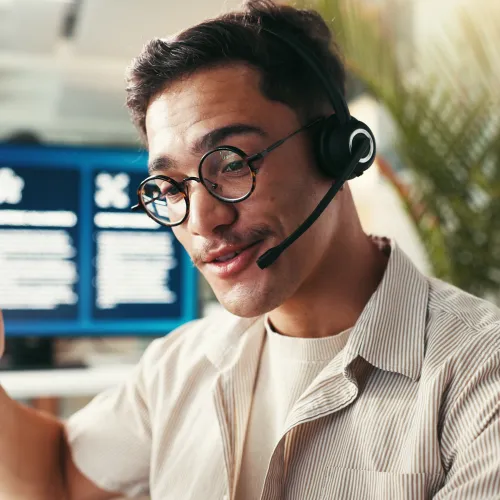 a man wearing headphones and a white shirt