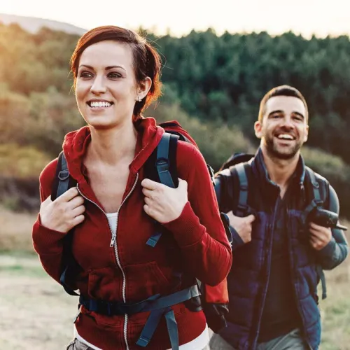 a woman and a man posing for a picture