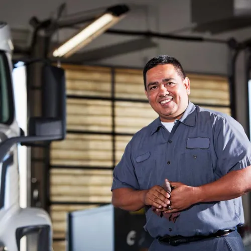 a man standing in a warehouse