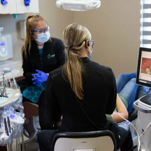 brittany albers and assistant do implant work