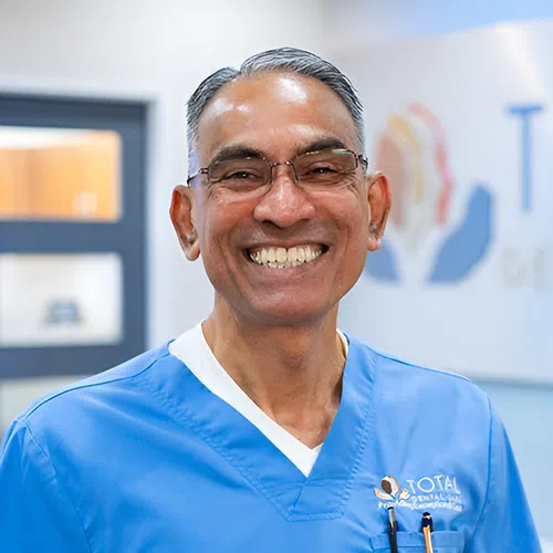 Smiling male dental professional