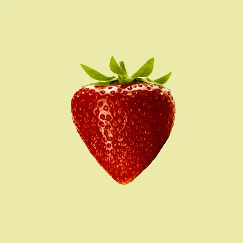 a close up of a strawberry