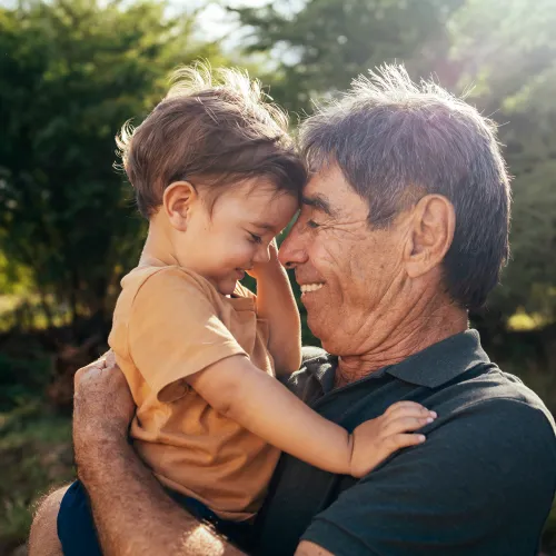 a person holding a baby