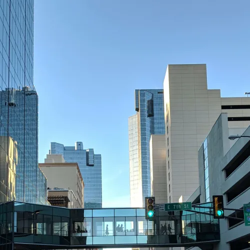 a street with cars and buildings on either side of it