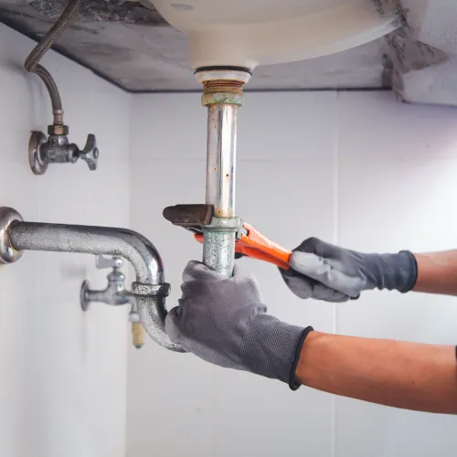 a person using a faucet