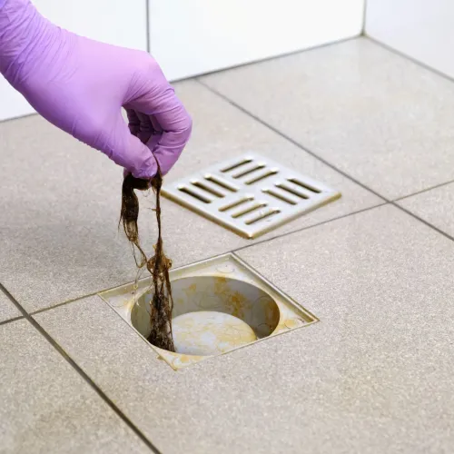 a person cleaning a floor