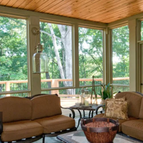 a wooden deck with a tile floor