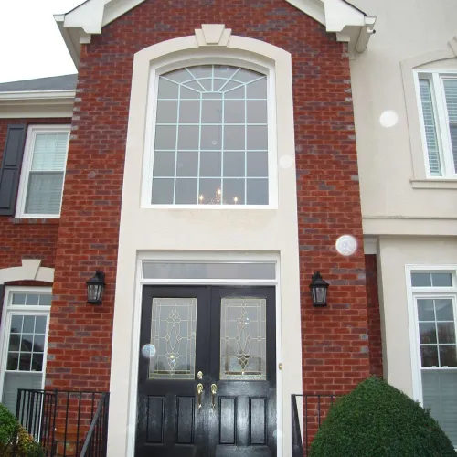 a close up of a brick home