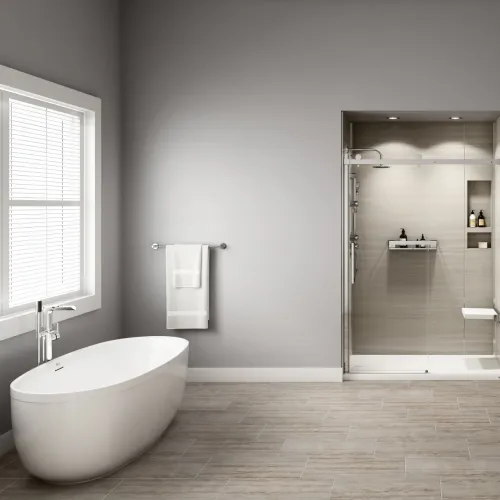 a bathroom with a large glass shower and freestanding tub