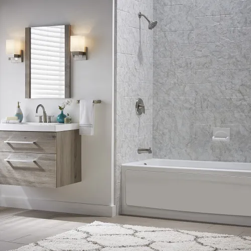 a large tub next to a sink