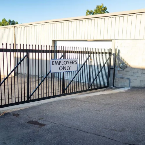 a gate with a sign on it