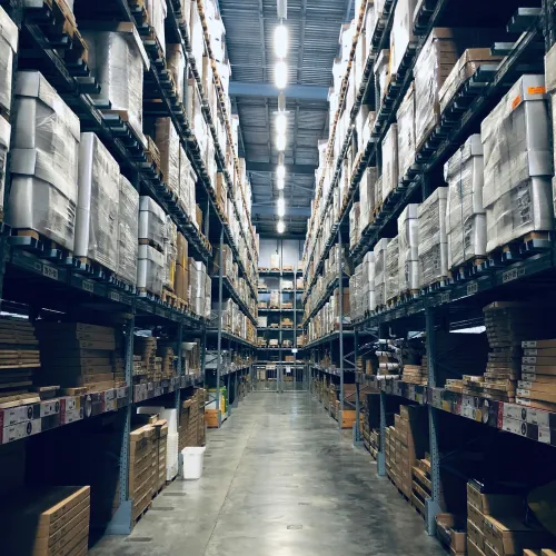 a long hallway with many bookshelves
