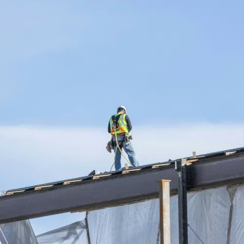 a man on a roof