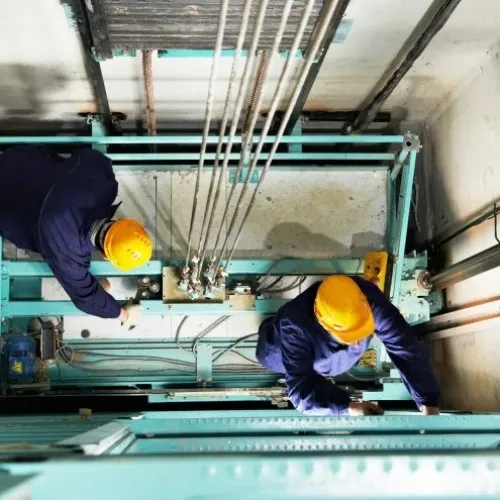 a few men working in a factory