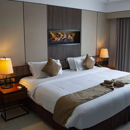 a bed with a white bed spread