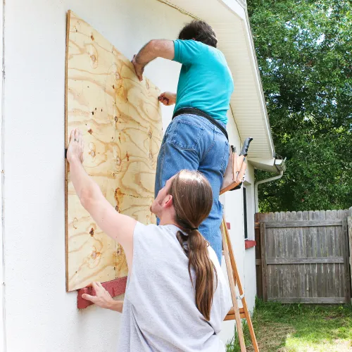 a person painting a wall