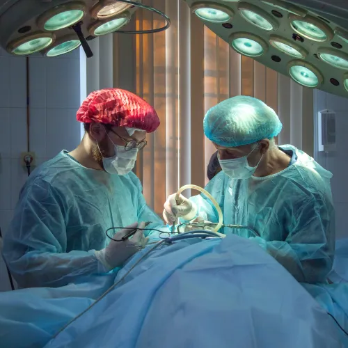 a group of surgeons performing surgery