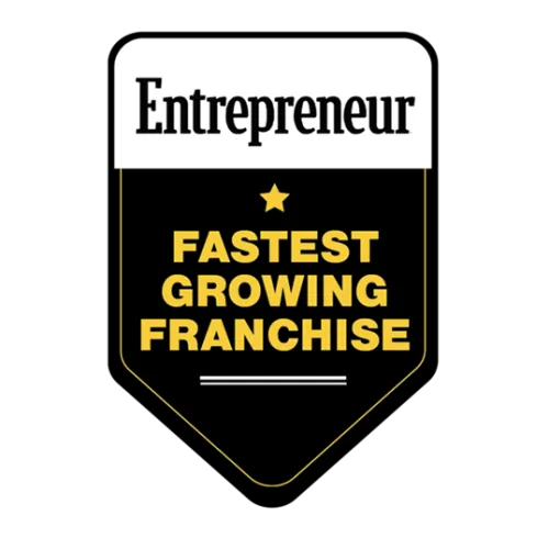 Entrepreneur logo with text highlighting the fastest growing franchise award.