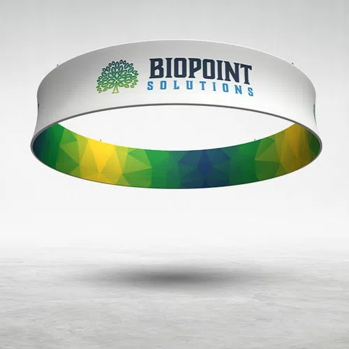 Suspended circular banner with Biopoint Solutions logo and a colorful geometric pattern inside the ring.