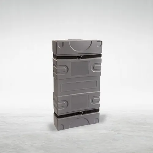 Gray modular plastic container with black straps standing on a light gray surface against a white background.