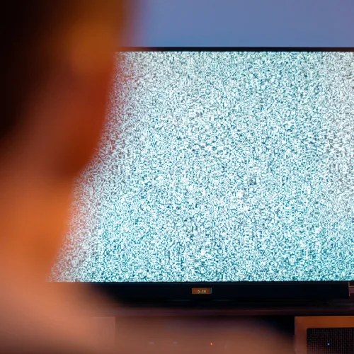 a television screen with a red and orange background