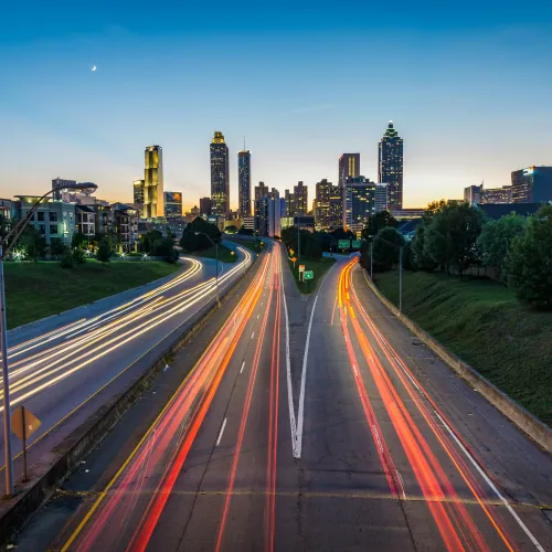 a highway with red lights