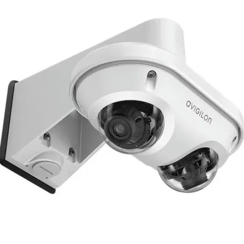 a white camera with a lens