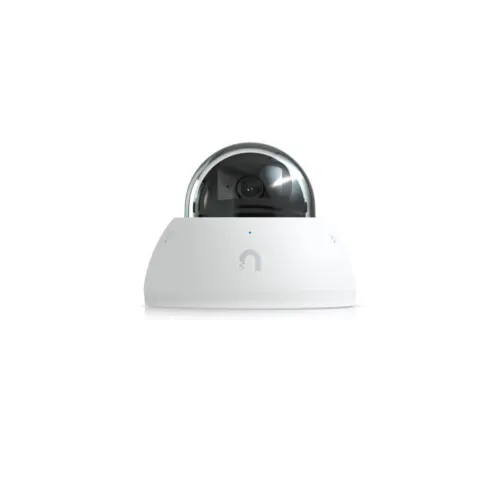 White dome security camera with a transparent upper hemisphere and black camera lens inside on a white base.