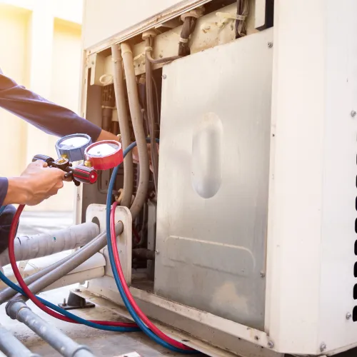 a person fixing a machine