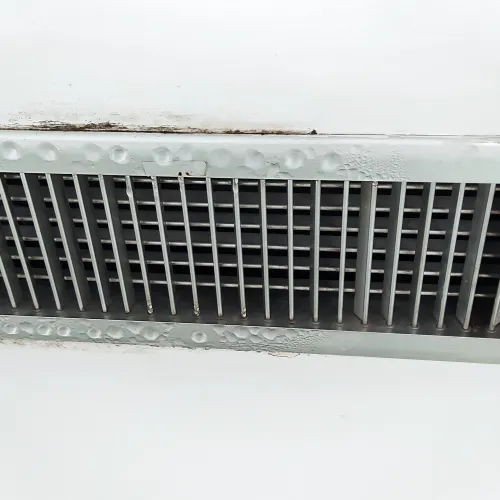 Home inspector in Atlanta, Georgia using infrared technology to uncover air duct leaks