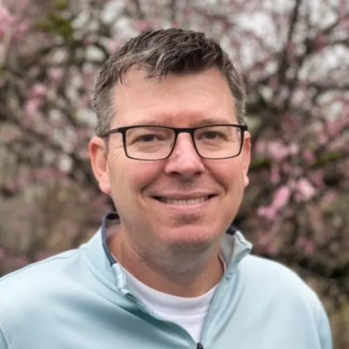 a man wearing glasses
