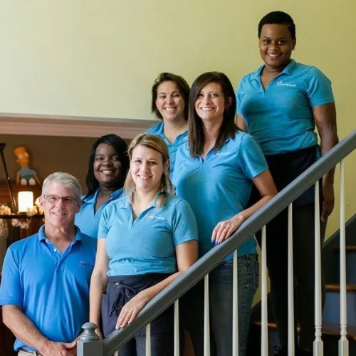 a group of people posing for a photo
