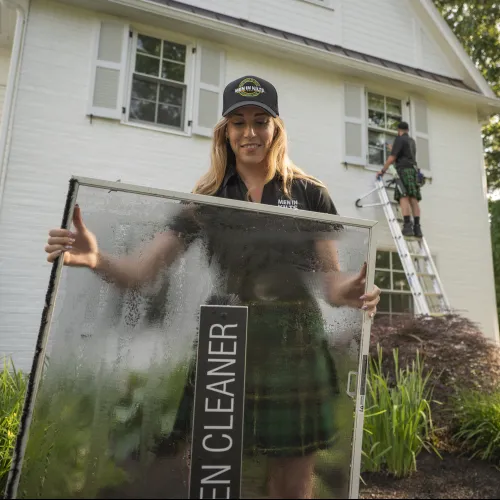 a person holding a sign