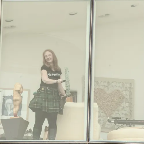 a person standing in front of a window