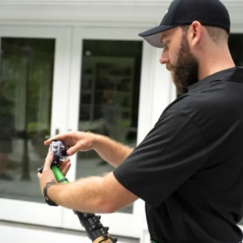 a man holding a gun