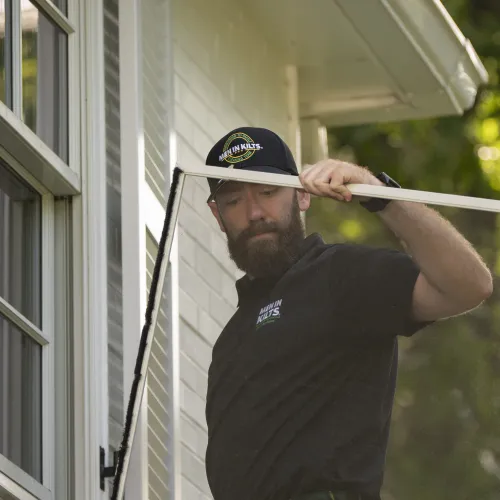 a man holding a golf club