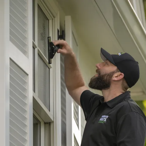 a man taking a picture of a building