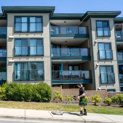 a person walking in front of a building