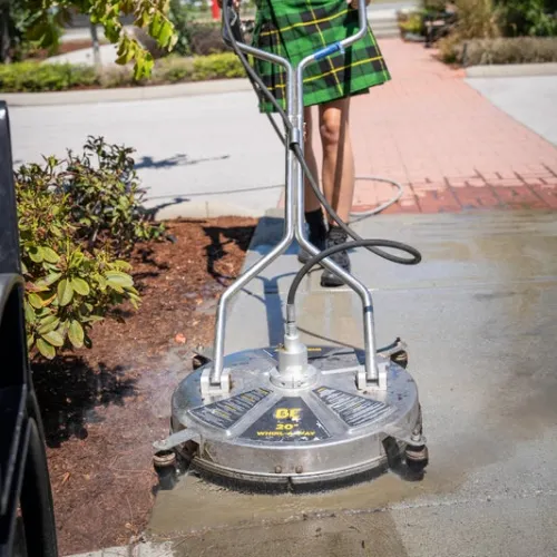 a man standing on a scooter