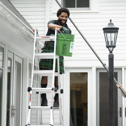 Alan Branch et al. on a ladder