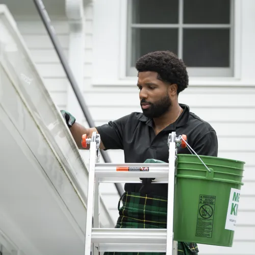 a man with a green bag