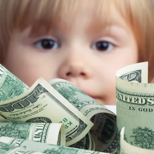 a baby with money